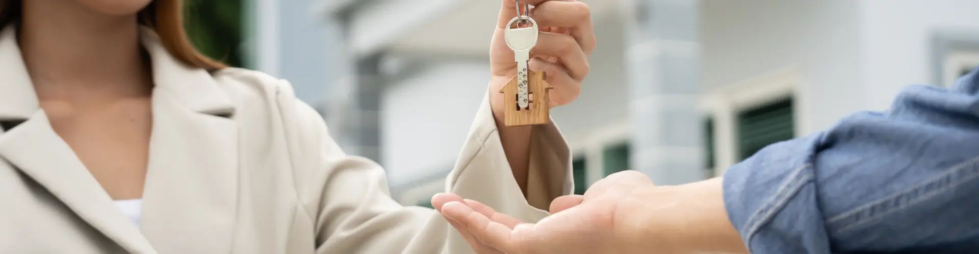 Verkauf eines Hauses symbolisch für den Verkauf einer Firma